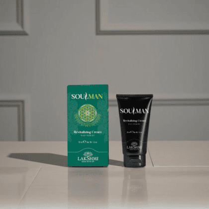 Green Soulman Revitalizing Cream box and black tube labeled Soulman on a white surface.